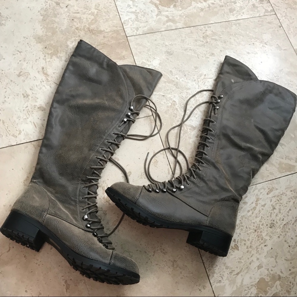 Knee high lace up boots